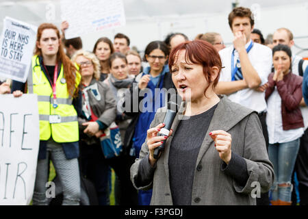 Bristol, UK, 10th October, 2015. Kerry McCarthy (Labour MP for Bristol East and Shadow Secretary of State for Environment, Food and Rural Affairs) is pictured as she speaks to protesters at the end of the save our NHS protest march and rally in Bristol. The march was organised to allow people to show their opposition to the new junior doctor contracts,many feel that the new contract will be a disaster for the NHS. Credit:  lynchpics/Alamy Live News Stock Photo