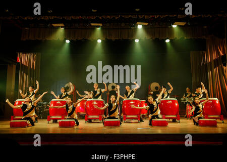 Beijing, China. 11th Oct, 2015. Students perform at opening ceremony of the 1st National Film Week for Primary and Middle School Students in Beijing, capital of China, Oct. 11, 2015. The 1st National Film Week for Primary and Middle School Students, which is themed with 70th anniversary of the victory of Chinese People's War of Resistance against Japanese Aggression and World War II, kicked off in Beijing 101 Middle School on Sunday. © Shen Bohan/Xinhua/Alamy Live News Stock Photo