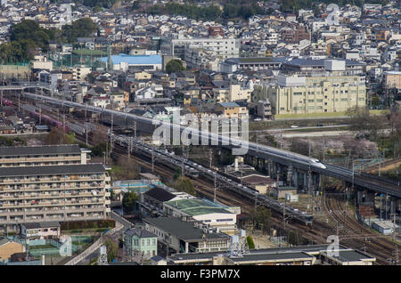 View from Kyoto Tower of the Shinkansen and local trains approaching and leaving Kyoto Station, Japan Stock Photo