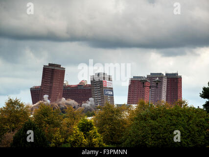 Glasgow, UK. 11th Oct, 2015. The last remaining Red Road flats are demolished in a controlled explosion on October 11, 2015 in Glasgow, Scotland. The 1960s blocks were once the tallest high rise blocks in Europe and were initially hailed as a welcome solution to Glasgows overcrowded slums. Credit:  Sam Kovak/Alamy Live News