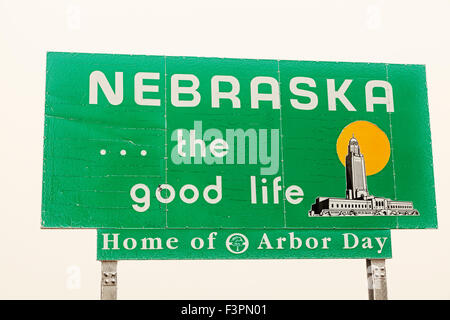 Nebraska Welcome Sign - seen during foggy day. Stock Photo