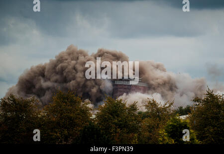 Glasgow, UK. 11th Oct, 2015. The last remaining Red Road flats are demolished in a controlled explosion on October 11, 2015 in Glasgow, Scotland. The 1960s blocks were once the tallest high rise blocks in Europe and were initially hailed as a welcome solution to Glasgows overcrowded slums. Credit:  Sam Kovak/Alamy Live News Stock Photo