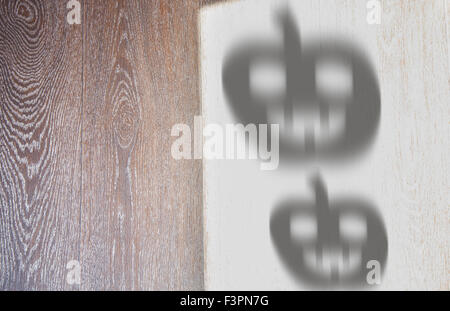 Shadows of Halloween pumpkins on a hardwood texture Stock Photo