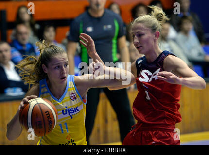 From left Katerina Elhotova of USK Praha and Courtney Vanderslootof USA fight for a ball during the friendly basketball match ZVVZ USK Praha vs USA in Prague, Czech Republic, October 10, 2015. (CTK Photo/Michal Krumphanzl) Stock Photo