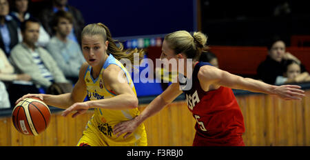 From left Katerina Elhotova of USK Praha and Courtney Vandersloot of USA fight for a ball during the friendly basketball match ZVVZ USK Praha vs USA in Prague, Czech Republic, October 10, 2015. (CTK Photo/Michal Krumphanzl) Stock Photo