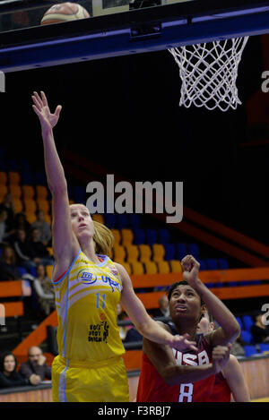 From left Katerina Elhotova of USK Praha and Agel McCoughtry of USA fight for a ball during the friendly basketball match ZVVZ USK Praha vs USA in Prague, Czech Republic, October 10, 2015. (CTK Photo/Michal Krumphanzl) Stock Photo