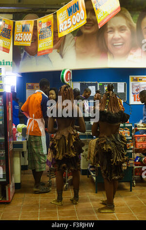 Women of the Himba tribe in the supermarket, Opuwo, Namibia, Africa Stock Photo