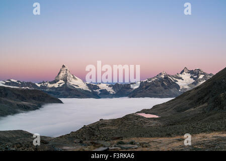 Matterhorn with clouds at dawn, Switzerland Stock Photo