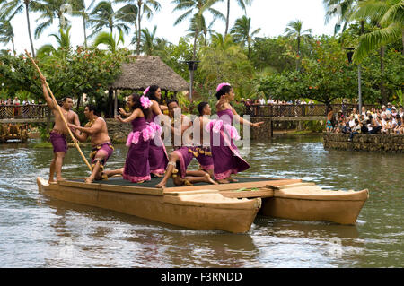Central show in one of the lakes called Rainbown of Paradise where canoes parade singing songs, dances and martial arts in each Stock Photo