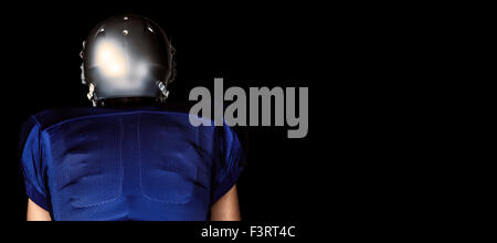 Composite image of rear view of american football player Stock Photo