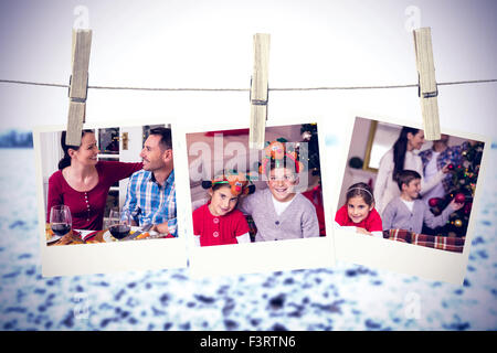 Composite image of photos hanging on a line Stock Photo
