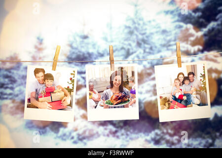 Composite image of happy father and son holding christmas presents Stock Photo