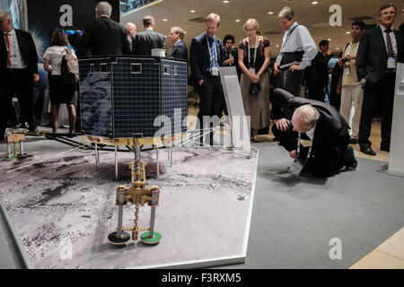 Israel. 12th October, 2015. DLR Germany mans a booth at the International Conference Center in Jerusalem as the 66th International Astronautical Congress 2015 opens bringing together over 2,000 participants from 60 nations including heads of space agencies and 15 astronauts. Credit:  Nir Alon/Alamy Live News Stock Photo