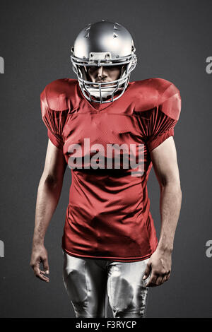 Composite image of confident american football player Stock Photo