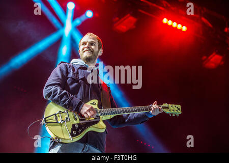 Munich, Germany. 11th Oct, 2015. Peter Brugger, singer of the band 'Sportfreunde Stiller' performs during the free 'Thank You' concert for volunteers who lend their support in the on-going refugee situation in Munich, Germany, 11 October 2015. Photo: Marc Mueller/dpa/Alamy Live News Stock Photo