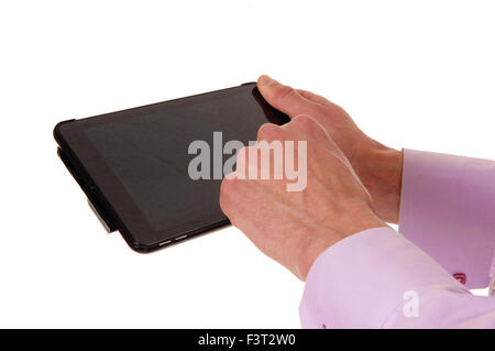 A closeup picture of two hands holding and working on a tablet pc, isolated for white background. Stock Photo