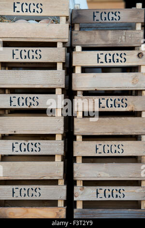 Handmade wooden egg boxes / trays on a stall at an Autumn Show. UK Stock Photo