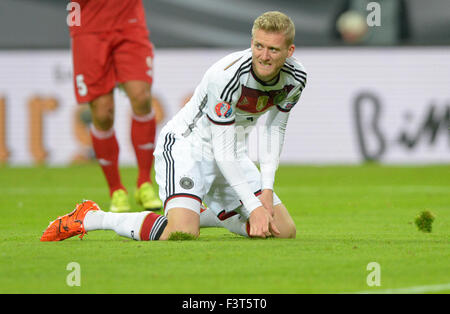 Leipzig, Germany. 11th Oct, 2015. Germany's Andre Schuerrle kneels during the EUFA EURO 2016 qualifying match between Germany and Georgia in the Arena in Leipzig, Germany, 11 October 2015. Photo: THOMAS EISENHUTH/dpa/Alamy Live News Stock Photo