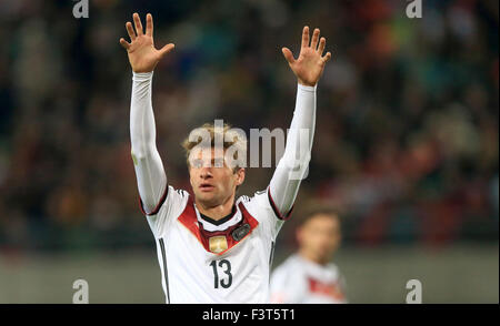 Leipzig, Germany. 11th Oct, 2015. Germany's Thomas Mueller gestures during the EUFA EURO 2016 qualifying match between Germany and Georgia in the Arena in Leipzig, Germany, 11 October 2015. Photo: THOMAS EISENHUTH/dpa/Alamy Live News Stock Photo