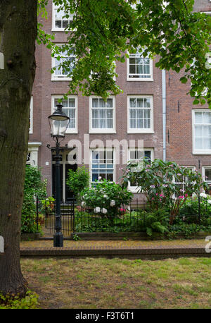 The Begijnhof is one of the oldest inner courts in the city of Amsterdam. Stock Photo