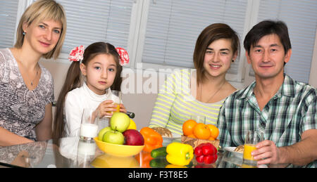 Breakfast of multiethnic family Stock Photo