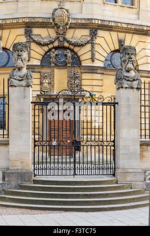 Emperor's Heads outside the 17th century Sheldonian Theatre at Broad Street in Oxford Oxfordshire England United Kingdom UK Stock Photo