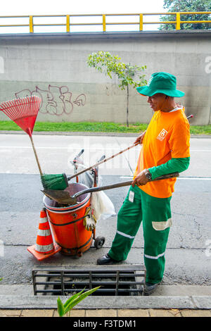 MEDELLIN, COLOMBIA - FEBRUARY 24, 2015: Street cleaner in Open streets day in Medellin Stock Photo