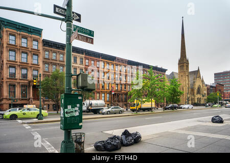 NEW YORK, USA - JUNE 16, 2015: Malcolm X Boulevard in Harlem district. Harlem is a large neighborhood within the northern sectio Stock Photo