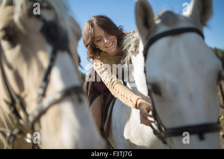 Beautiful girl riding a horse Stock Photo