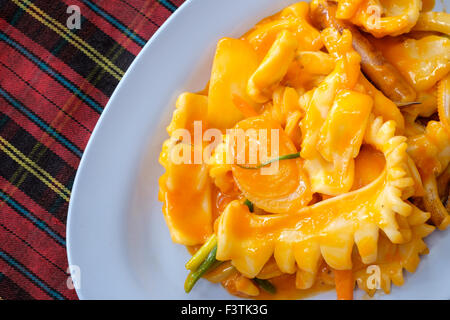 Stir fried squid with salted egg, Traditional Thai food Stock Photo