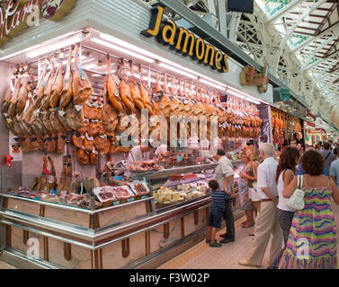 Cured ham shop, Spanish market, Mercado Central Valencia. Stock Photo