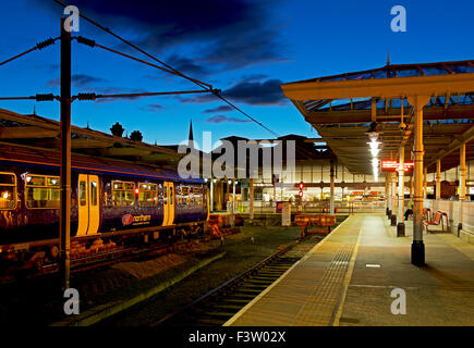 Railway station at night, Ilkley, West Yorkshire, England UK Stock Photo