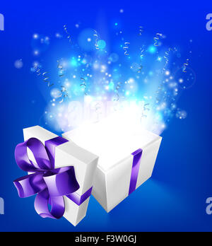 A glowing magical gift box concept for an exciting birthday, Christmas or other gift or present. Stock Photo