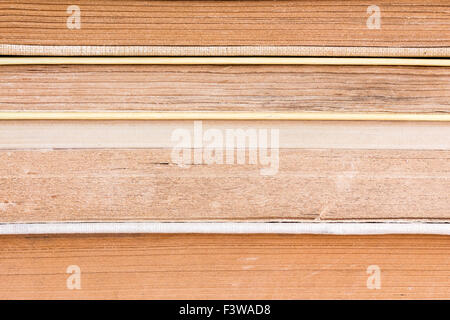 Side view of stacked books, extreme close up Stock Photo