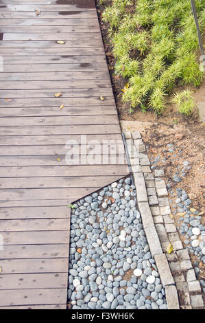a rectangular brick walkway and pebble Stock Photo - Alamy