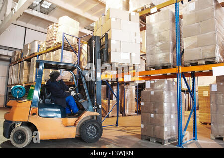 warehouse forklift loader worker Stock Photo