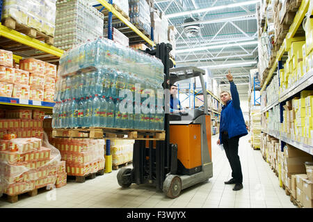 distribution in warehouse with forklift Stock Photo
