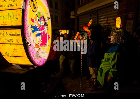 The Morgenstraich is the begin of Basler Fasnet, at 4 am hundreds of colorful laterns get lighted and carried through the street Stock Photo