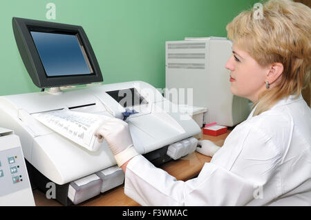 woman Scientist using medical equipment Stock Photo