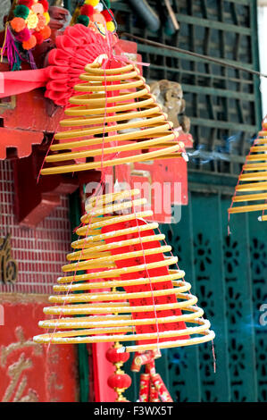 A view of hanging incense coils in temple Stock Photo