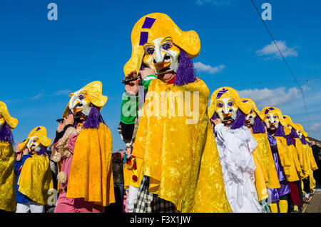 Masked men and women are joining the great procession of Basler Fasnet, one of the most spectacular events Stock Photo