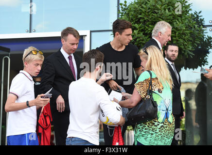 Matteo Darmian and Morgan Schneiderlin mobbed by fans as they arrive back at their hotel after Training.  Featuring: Matteo Darmian Where: Manchester, United Kingdom When: 12 Aug 2015 Stock Photo