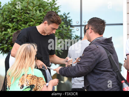 Matteo Darmian and Morgan Schneiderlin mobbed by fans as they arrive back at their hotel after Training.  Featuring: Matteo Darmian Where: Manchester, United Kingdom When: 12 Aug 2015 Stock Photo