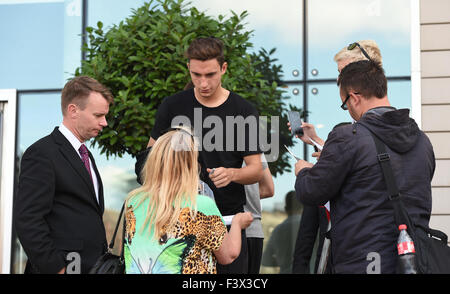 Matteo Darmian and Morgan Schneiderlin mobbed by fans as they arrive back at their hotel after Training.  Featuring: Matteo Darmian Where: Manchester, United Kingdom When: 12 Aug 2015 Stock Photo