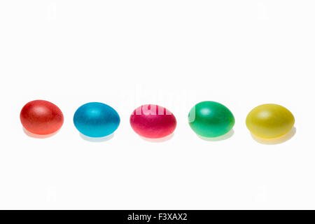 Row of five Easter eggs, isolated Stock Photo