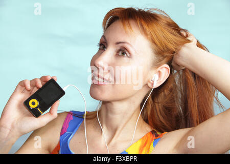 Girl listens music Stock Photo