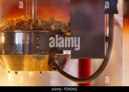 Making popcorn with an electric popper at home Stock Photo - Alamy