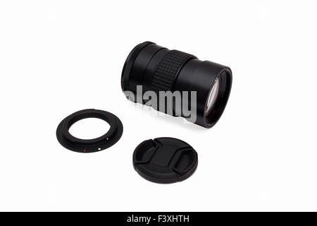 Lens with an adapter and a protective cover on a white background. Stock Photo