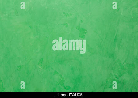 Background of green Venetian plaster. Stock Photo