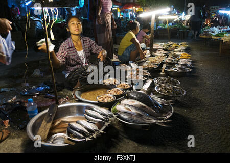 Fishwife at street market, Rangun, Myanmar Stock Photo